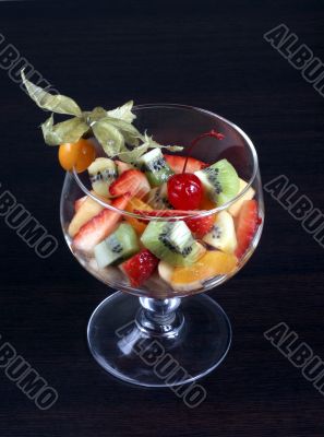 fruit salad in tall wine glass