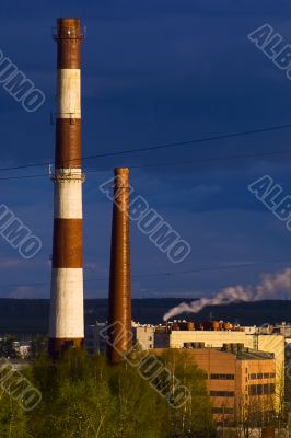 Couple of industrial tubes in sunlight