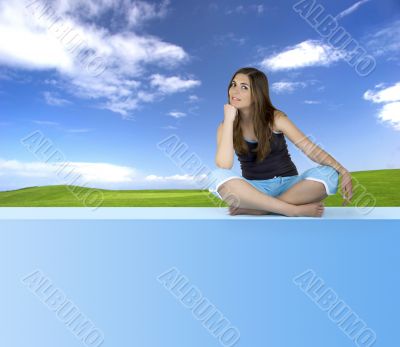 Beautiful Athletic woman relaxing in a window