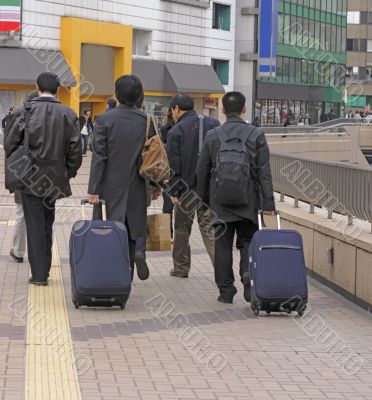 Businessmen travellers group