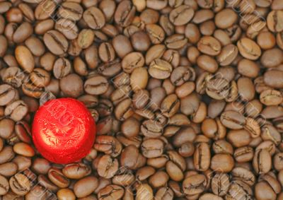 Red chocolate on coffee Red chocolate on coffee