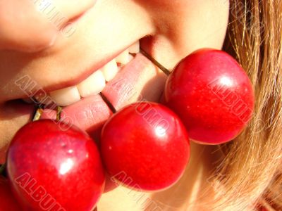 The girl with a sweet cherry