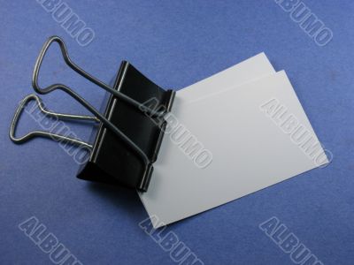 bulldog clip and business cards