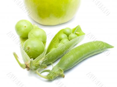 Pods of a green peas, plum and apple