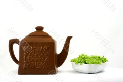 Chinese teapot and fresh green