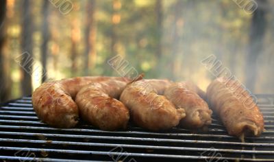 Five sausage on the grill