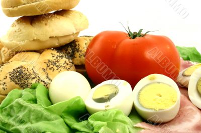 Tomato, eggs, rolls