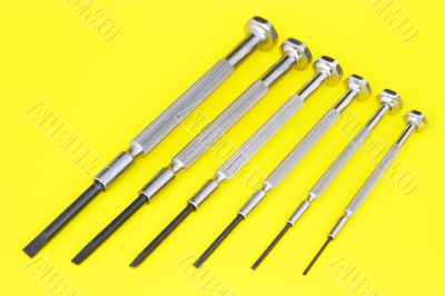 row of screw drivers