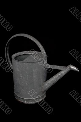 watering can on black
