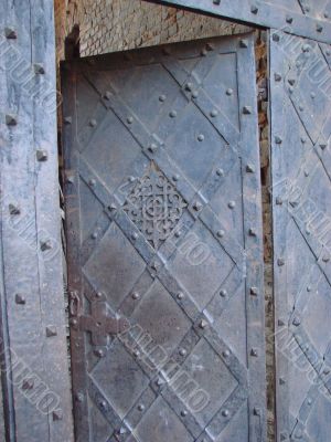 Aged door lock on wooden door