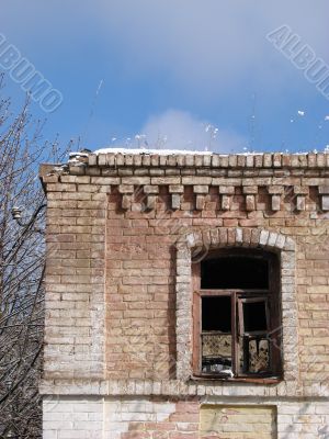 Corner of aged ruined and modern urban walls