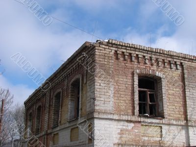 Corner of aged ruined and modern urban walls