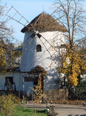 Ancient Ukrainian Mill in Summer Village