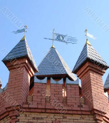 Castle, Towers with Feathers Upon Blue Sky