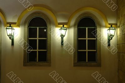 Facade of windows and antique lanterns