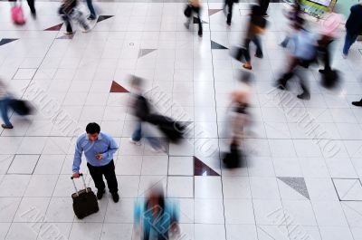 Busy man deciding the way to go