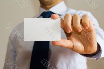 Business man holding a name card