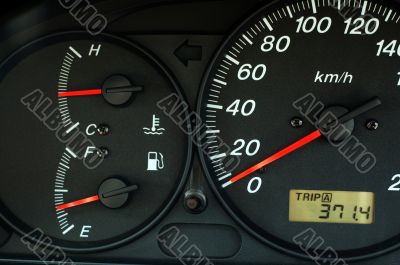 Car dashboard with speed, temperature and fuel