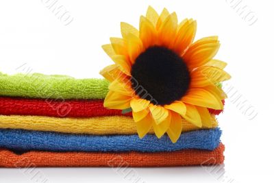 Artificial flower on towels
