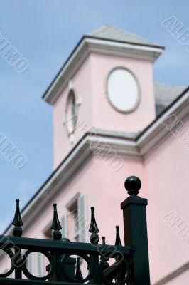 Black Fence Pink Building
