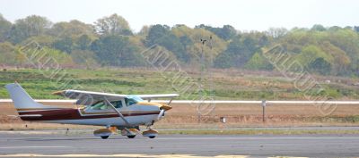 Brown and White Plane Landing