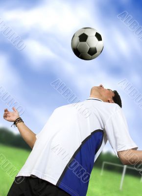 footballer chesting the ball