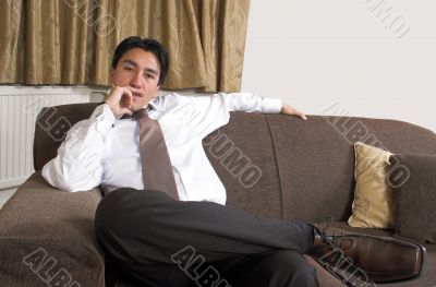 business man on a sofa