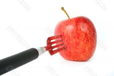 apple on fork - perspective