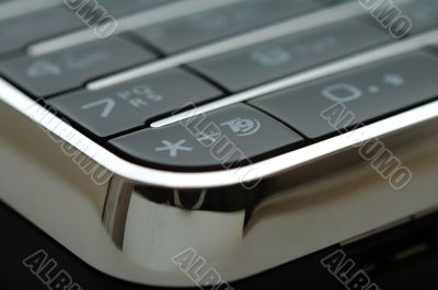 Close up shot of mobile keypad under light