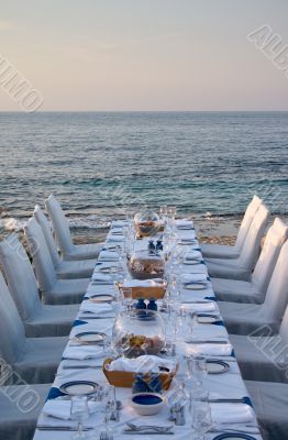 served table on the sea shore