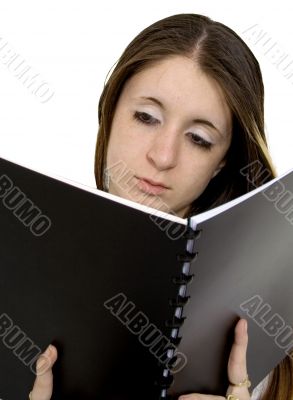 teenager reading a book