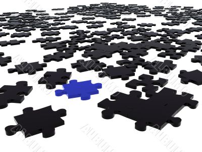 black puzzle piece amongst black ones