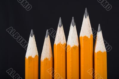 black pencils standing out