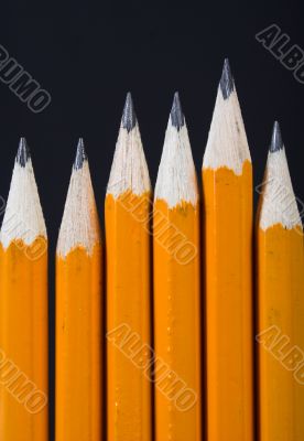 black pencils standing out - vertical