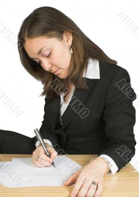 business woman signing papers