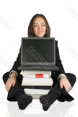 adult business learning - laptop on books