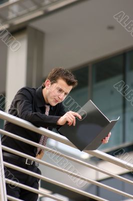 business man reading manual - arisv