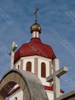 Orthodox Church with red Cupola with Holy Cross