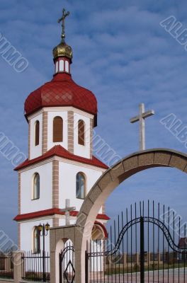 Orthodox Church with red Cupola with Holy Cross