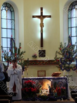 Roman catholic pastor praying inside dome