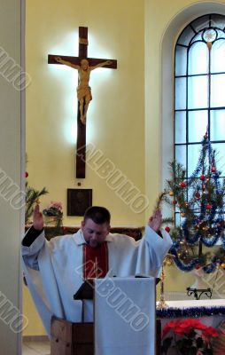 Roman catholic pastor praying inside dome