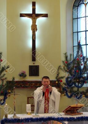 Roman catholic pastor praying inside dome