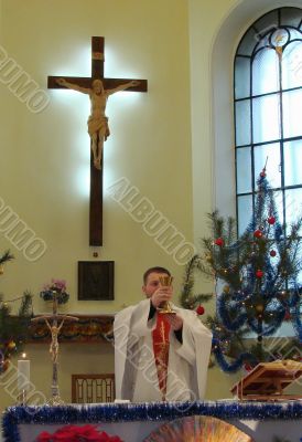 Roman catholic pastor praying inside dome