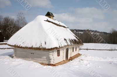 Old rural hut under the snow Old rural hut under the snow