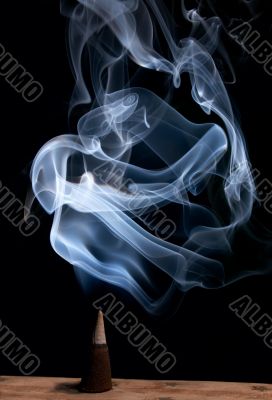 incense cone with smoke