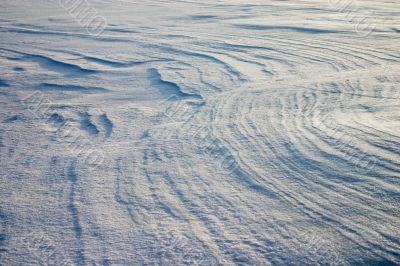 Erosion on the snow plain