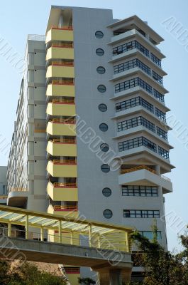 A tall academic building in a campus