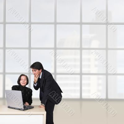 business couple with laptop over white 2