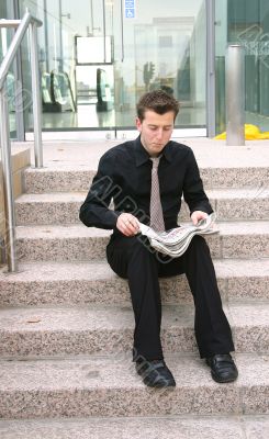 business man reading news