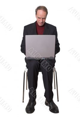Business Man browsing on laptop